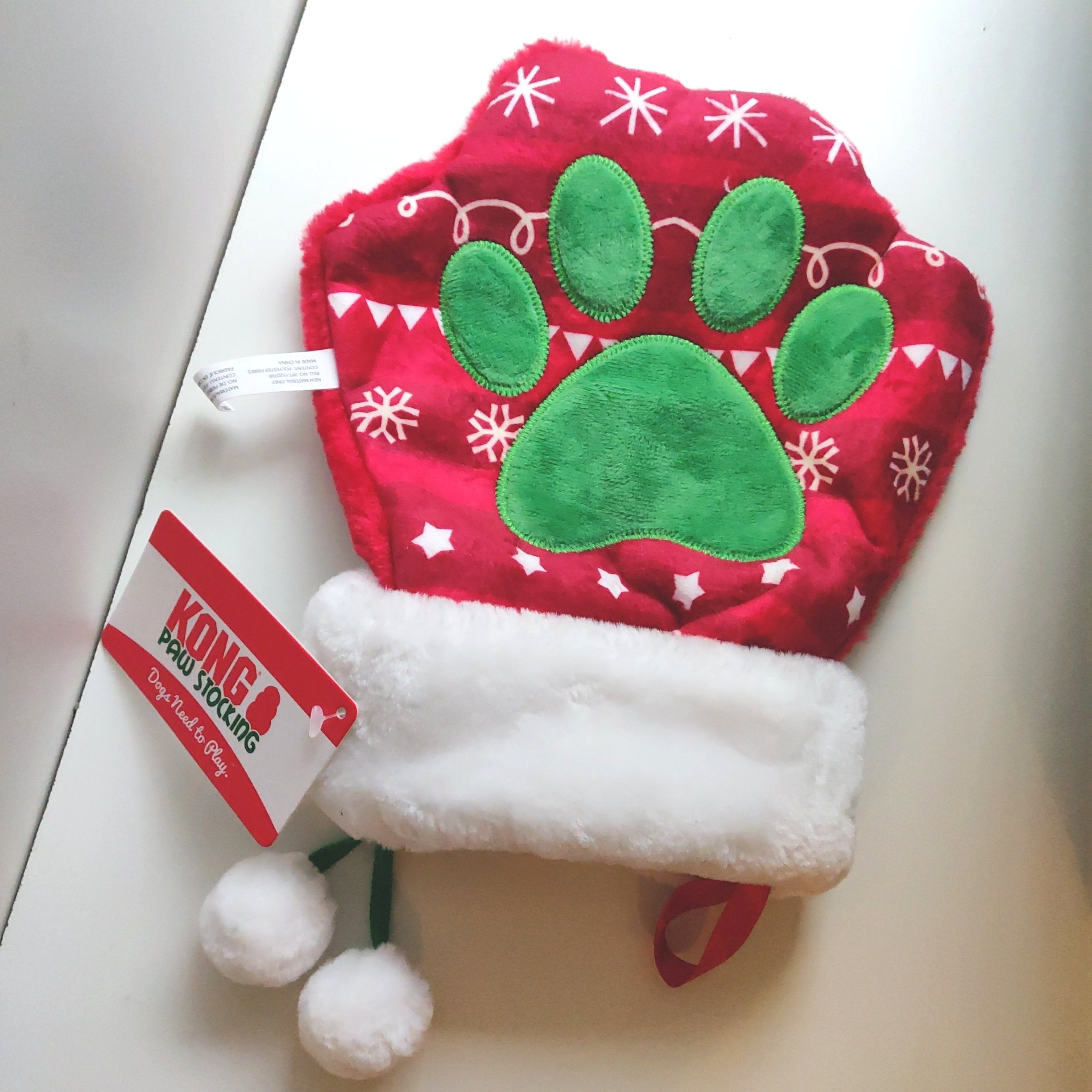 Kong Holiday Stocking Paw Os med kaeledyr